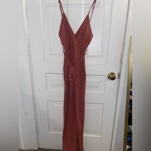 Long peach colored dress with slit